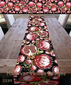 Proteas on black table runner