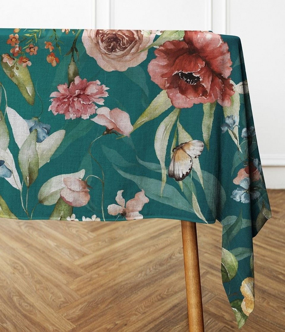 Large flowers on green tablecloth